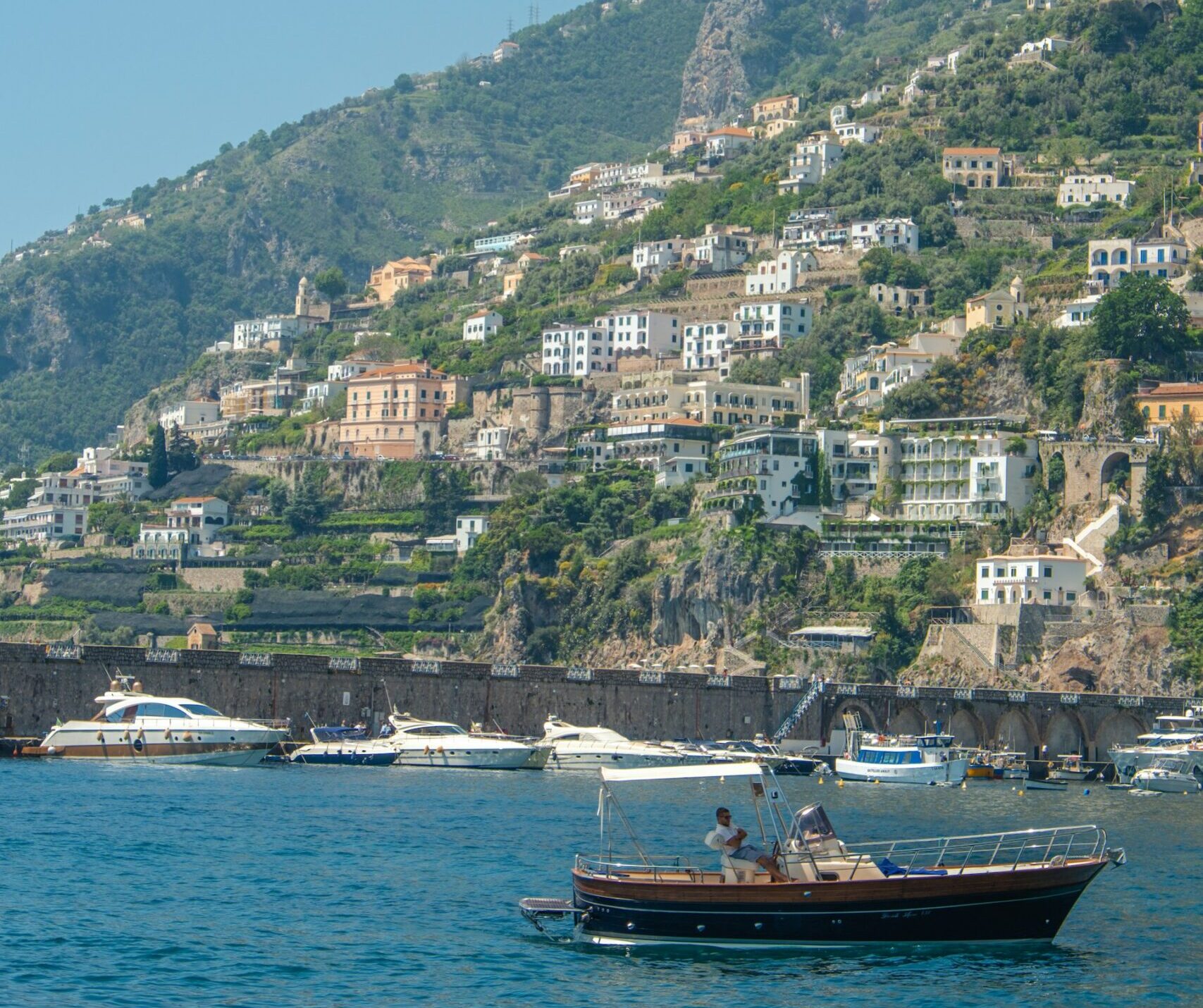 Boat arriving in Positano seen from the sea ferry route