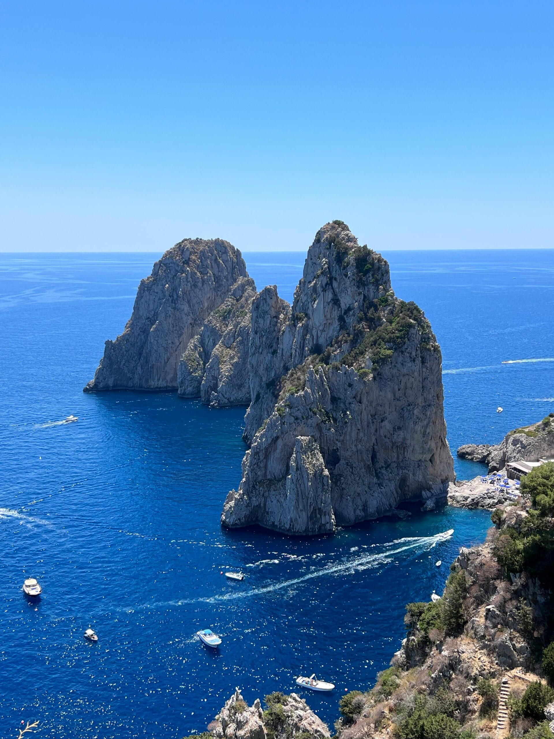 Faraglioni rocks in Capri, popular day trip from Sorrento
