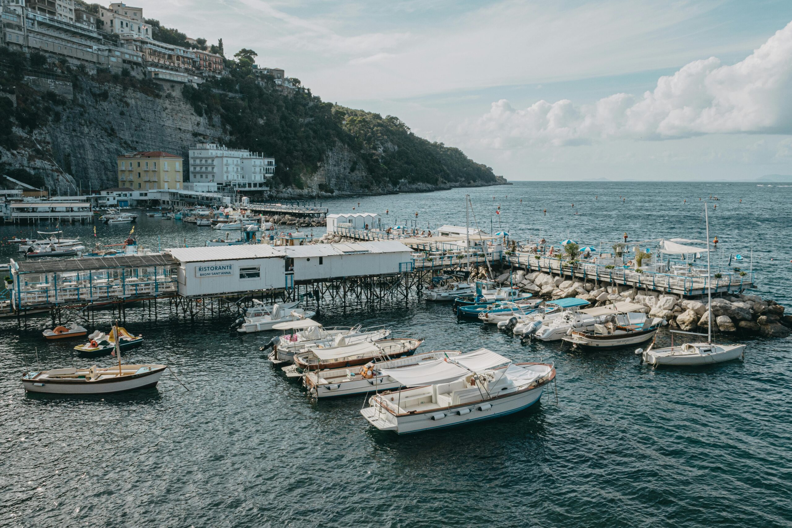 Colorful boats and restaurants in Marina Grande fishing village Sorrento