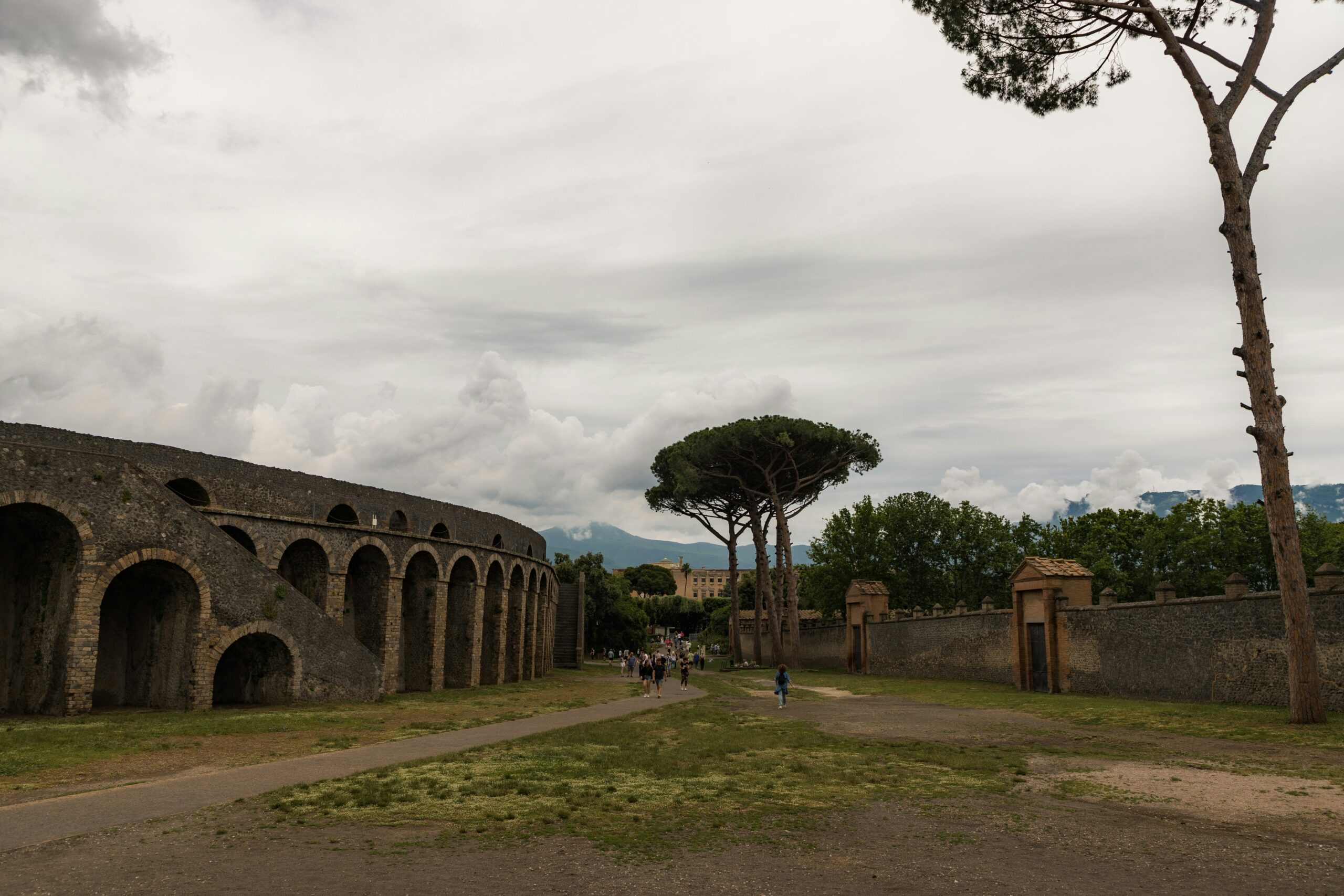 Ancient ruins of Pompeii with Mount Vesuvius rising in the background