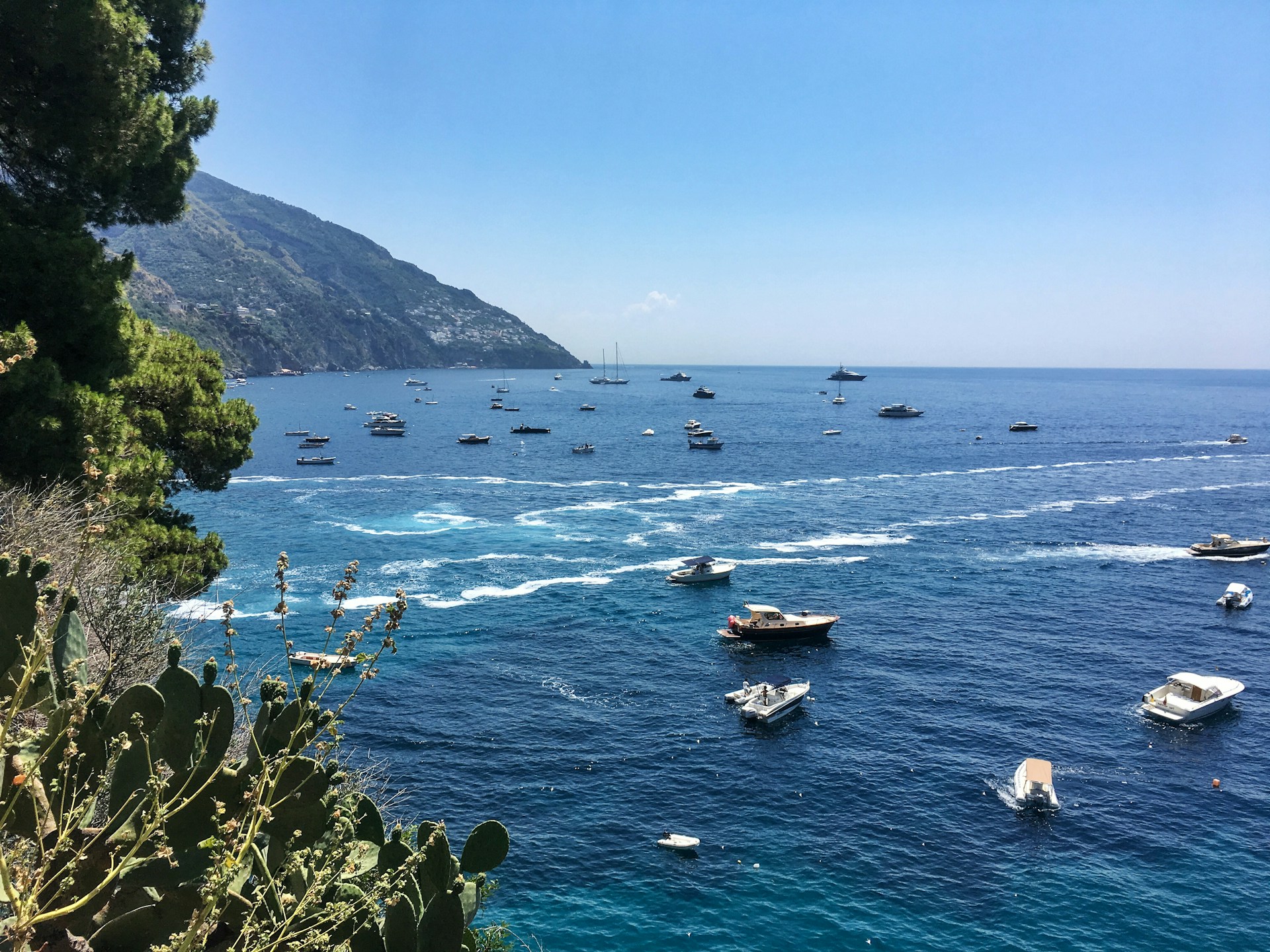 View of the sea between Sorrento and Positano with boats during summer